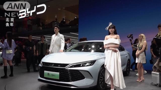 <p><ruby><rb><span class="unknown" word="中国">中国</span></rb><rt>ちゅうごく</rt></ruby>BYD <ruby><rb><span class="unknown" word="売り上げ">売</rb><rt>う</rt></ruby>り<ruby><rb>上</rb><rt>あ</rt></ruby>げ1000<ruby><rb>億</rb><rt>おく</rt></ruby></span>ドル<ruby><rb><span class="jlpt-n1" word="超">超</span></rb><rt>ちょう</rt></ruby>　<ruby><rb><span class="jlpt-n5" word="電気">電気</span></rb><rt>でんき</rt></ruby><ruby><rb><span class="jlpt-n5" word="自動車">自動車</span></rb><rt>じどうしゃ</rt></ruby><span class="jlpt-n1" word="メーカー">メーカー</span>として<ruby><rb><span class="jlpt-n1" word="初">初</span></rb><rt>はつ</rt></ruby>　テスラ<ruby><rb>抜</rb><rt>ぬ</rt></ruby>き<ruby><rb><span class="jlpt-n3" word="再び">再</rb><rt>ふたた</rt></ruby>び</span><ruby><rb><span class="unknown" word="世界一">世界一</span></rb><rt>せかいいち</rt></ruby>に</p>