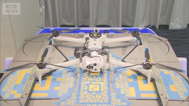 <span class="" word="A">A</span><span class="" word="I">I</span><span class="" word="ド">ド</span><span class="" word="ロ">ロ</span><span class="" word="ー">ー</span><span class="" word="ン">ン</span><span class="" word="が">が</span><ruby ><rb><span class="unknown" word="石川">石川</span><span class="jlpt-n3" word="県">県</span></rb><rt>いしかわけん</rt></ruby><span class="" word="で">で</span><ruby ><rb><span class="" word="使">使</span></rb><rt>つか</rt></ruby><span class="" word="わ">わ</span><span class="" word="れ">れ</span><span class="" word="ま">ま</span><span class="" word="す">す</span>