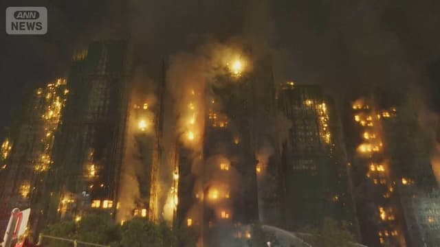 <ruby ><rb><span class="unknown" word="香港">香港</span></rb><rt>ほんこん</rt></ruby><span class="" word="の">の</span><span class="jlpt-n2" word="マンション">マンション</span><span class="" word="で">で</span><ruby ><rb><span class="" word="大">大</span></rb><rt>おお</rt></ruby><span class="" word="き">き</span><span class="" word="な">な</span><ruby ><rb><span class="jlpt-n4" word="火事">火事</span></rb><rt>かじ</rt></ruby><span class="" word="　">　</span><span class="" word="1">1</span><span class="" word="6">6</span><span class="" word="0">0</span><ruby ><rb><span class="jlpt-n5" word="人">人</span></rb><rt>にん</rt></ruby><span class="" word="が">が</span><span class="" word="な">な</span><span class="" word="く">く</span><span class="" word="な">な</span><span class="" word="る">る</span>