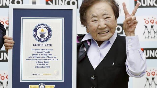 <span class="" word="7">7</span><span class="" word="0">0</span><ruby ><rb><span class="jlpt-n5" word="年">年</span><span class="jlpt-n4" word="以上">以上</span></rb><rt>ねんいじょう</rt></ruby><ruby ><rb><span class="" word="同">同</span></rb><rt>おな</rt></ruby><span class="" word="じ">じ</span><ruby ><rb><span class="jlpt-n5" word="会社">会社</span></rb><rt>かいしゃ</rt></ruby><span class="" word="で">で</span><ruby ><rb><span class="" word="働">働</span></rb><rt>はたら</rt></ruby><span class="" word="い">い</span><span class="" word="た">た</span><ruby ><rb><span class="unknown" word="日本人">日本人</span></rb><rt>にほんじん</rt></ruby><ruby ><rb><span class="jlpt-n4" word="女性">女性</span></rb><rt>じょせい</rt></ruby><span class="" word="、">、</span><span class="" word="ギ">ギ</span><span class="" word="ネ">ネ</span><span class="" word="ス">ス</span><ruby ><rb><span class="jlpt-n3" word="記録">記録</span></rb><rt>きろく</rt></ruby><span class="" word="に">に</span>